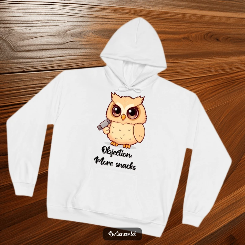Funny Owl Judge Hoodie showcasing a fluffy owl with big eyes holding a tiny gavel, a humorous piece for legal minds.